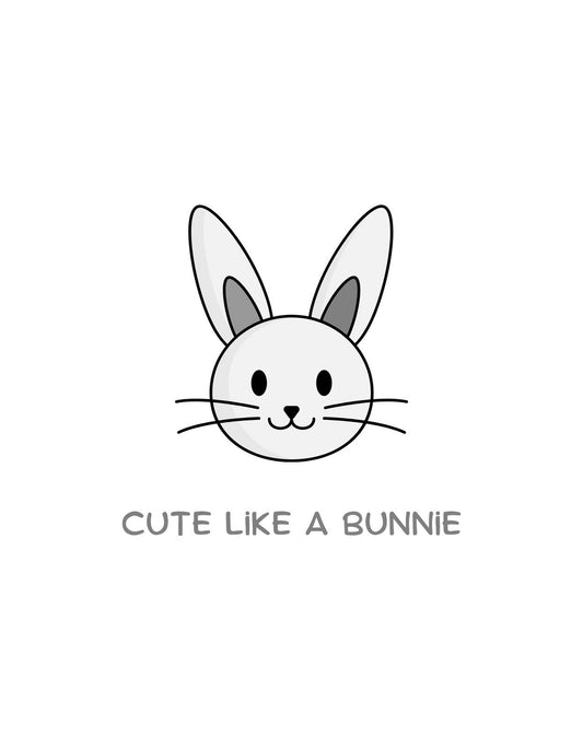 Egy aranyos nyuszi fejet ábrázoló rajz látható, egyszerű és tiszta vonalvezetéssel, a "CUTE LIKE A BUNNIE" felirattal. 