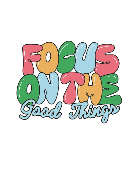 Vidám, színes betűkkel van írva a "Focus on the Good Things" szöveg, ami pozitív hangulatot áraszt, vidámságot sugároz. 