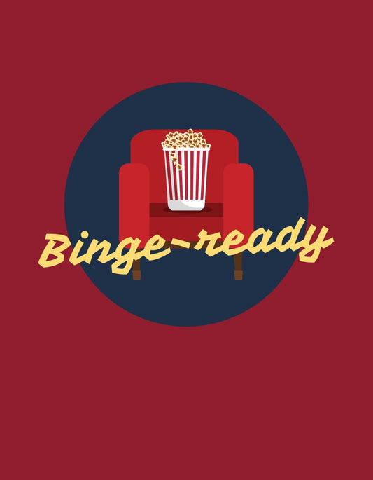 Egy piros fotelban helyezkedik el egy pattogatott kukorica teli vászonkosár a "Binge-ready" felirattal körülötte, ami kényelmes és hangulatos filmezésre hangol. 